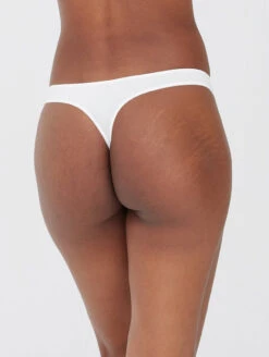 Skarlett Blue Entice Thong 7 Skarlett Blue Entice Thong -FOREVER YOUR LINGERIE 371143EnticeLaceThongNylonWhiteBackEdited